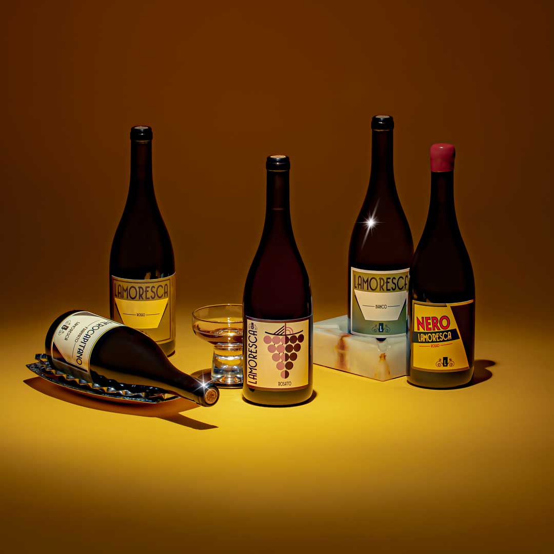 Five Lamoresca wines lined up together—distinctive labels and earthy tones—offering a full look inside the cult Sicilian estate’s tightly held lineup.