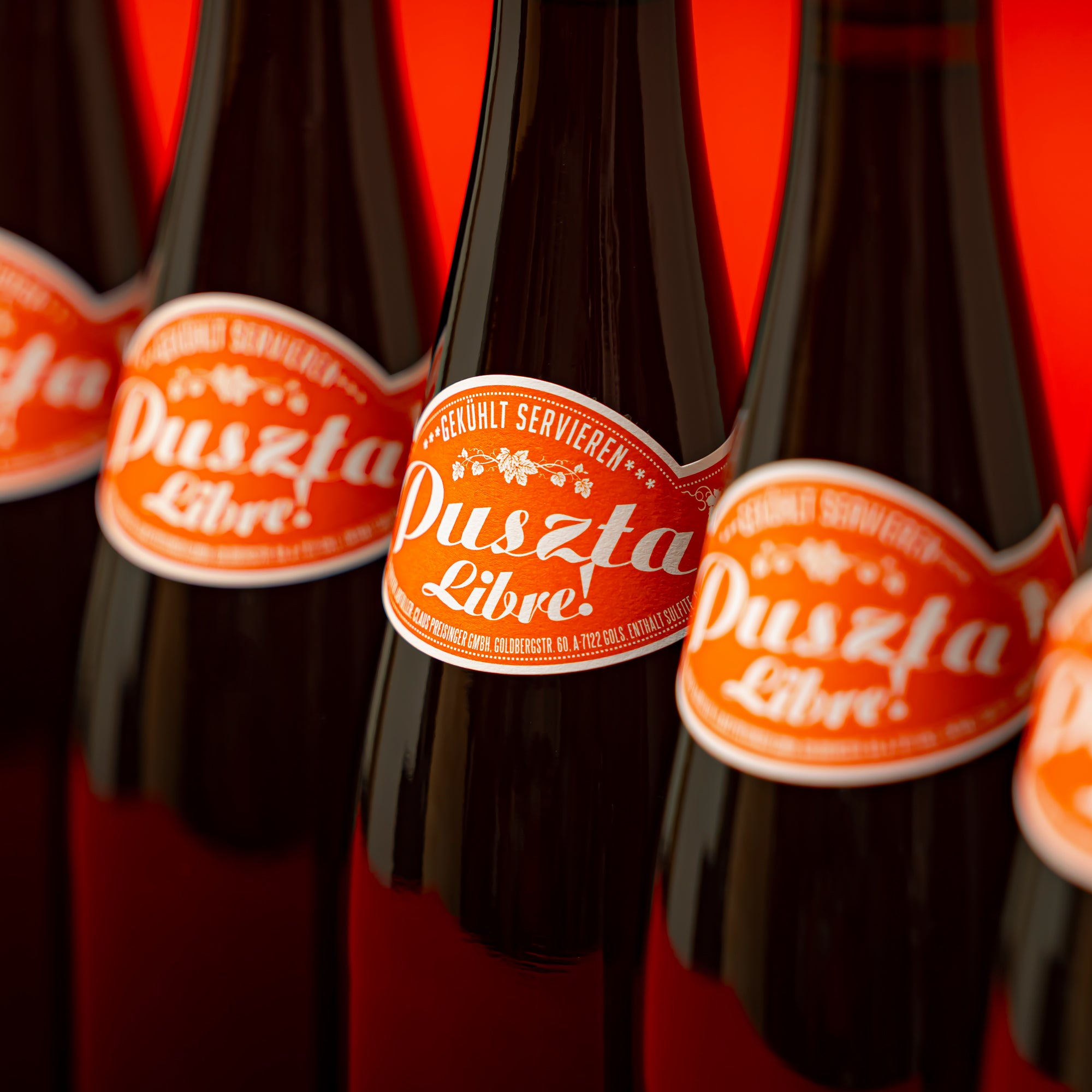 Puszta Libre! bottles on a red background